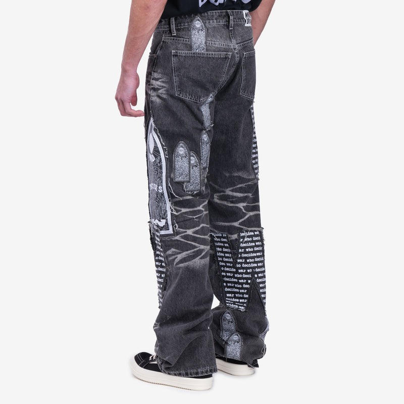 Mens Who Decides War Motif Patched Jeans in Vintage Grey